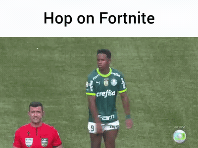 Soccer Player In Green Jersey With Referee GIF