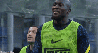Soccer Player In Green Nike Vest Smiling GIF