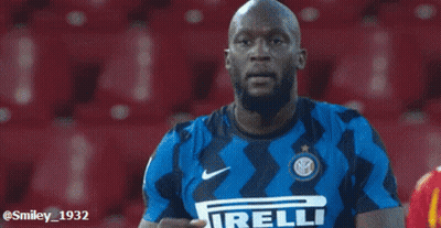 Soccer Player In Irelli Jersey Covering Face GIF