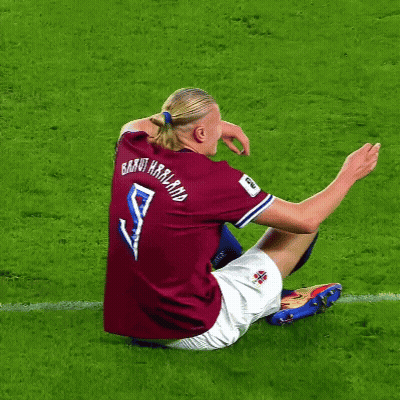 Soccer Player In Maroon Jersey Number 8 Sitting On Grass GIF