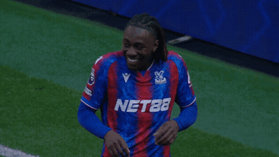 Soccer Player In Nets Jersey Laughing GIF