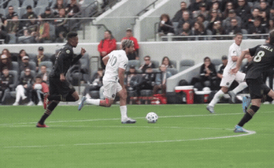 Soccer Player In Number 10 Jersey Kicking Ball GIF