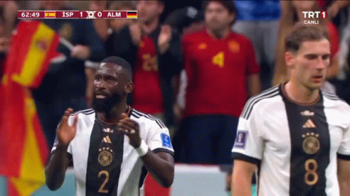 Soccer Player In Number 2 Jersey Next To Another Player GIF