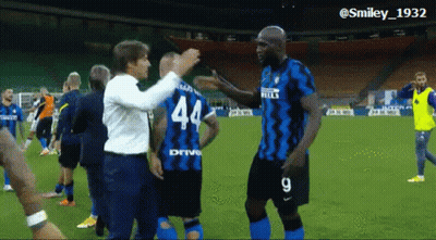 Soccer Player In Number 44 Jersey Hugging Another Player GIF