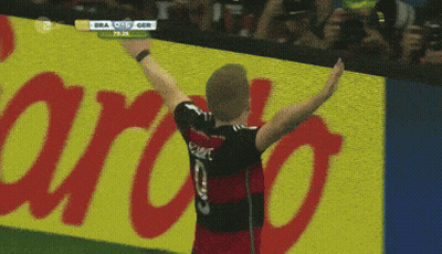 Soccer Player In Number 9 Jersey Pointing To Crowd GIF