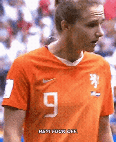 Soccer Player In Orange Shirt Number 9 GIF