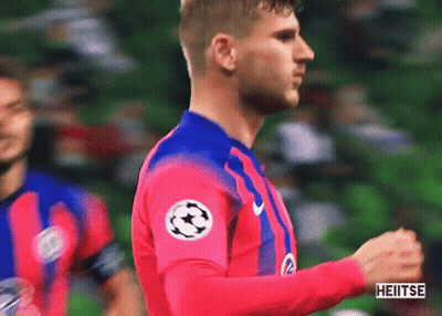 Soccer Player In Pink And Blue Jersey With Soccer Ball GIF