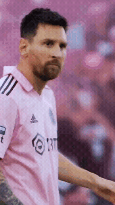 Soccer Player In Pink Jersey On Field GIF