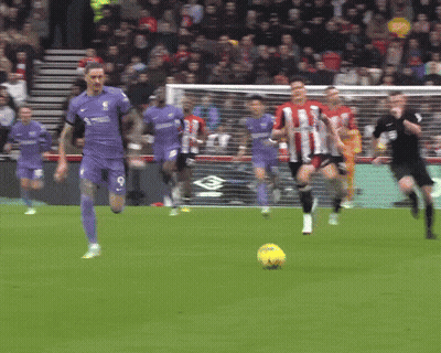 Soccer Player In Purple Jersey Number 9 GIF