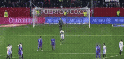 Soccer Player In Purple Jersey On Soccer Field GIF