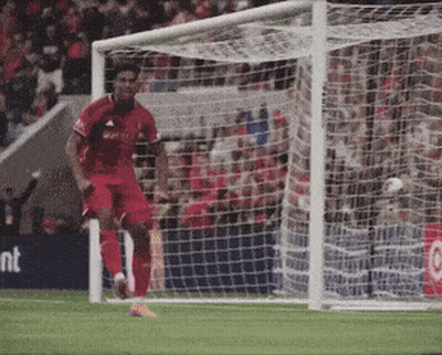 Soccer Player In Red Adidas Jersey Running Towards Goal GIF