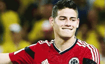 Soccer Player In Red Adidas Jersey Smiling GIF
