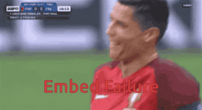 Soccer Player In Red AIG Jersey Holding Fist Up GIF