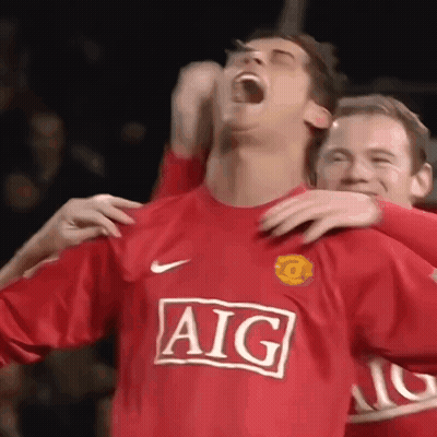 Soccer Player In Red AIG Jersey Hugged GIF