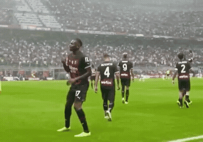 Soccer Player In Red And Black Fly Emirates Jersey GIF