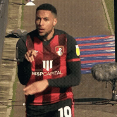Soccer Player In Red And Black Jersey GIF