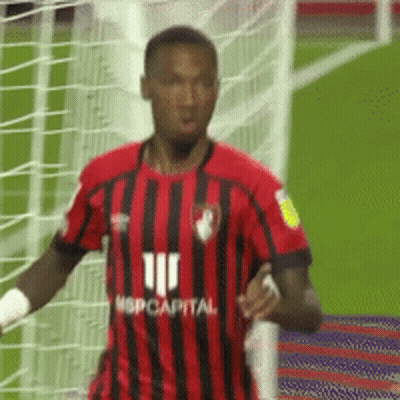 Soccer Player In Red And Black Jersey GIF