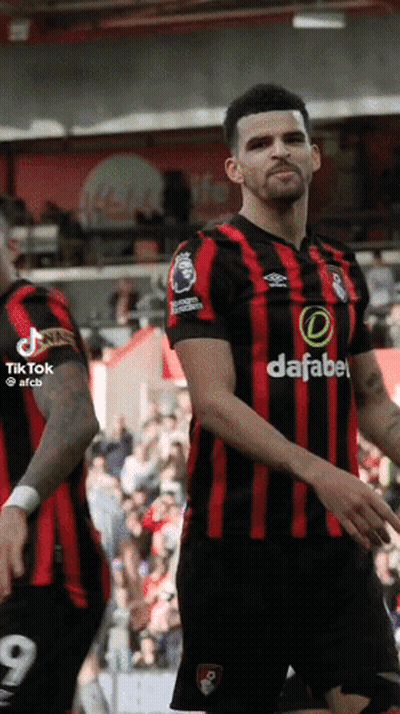 Soccer Player In Red And Black Jersey Saying Dafabe GIF