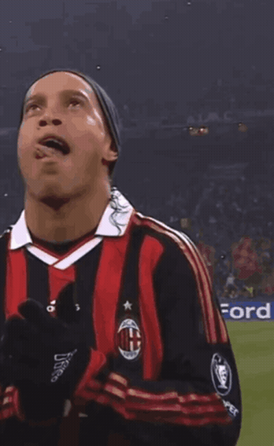 Soccer Player In Red And Black Striped Adidas Jersey GIF