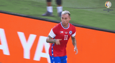 Soccer Player In Red And Blue Jersey Number 12 GIF