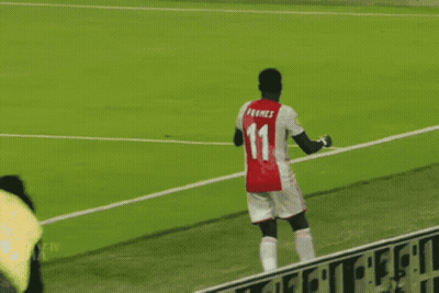 Soccer Player In Red And White Ajax Jersey GIF