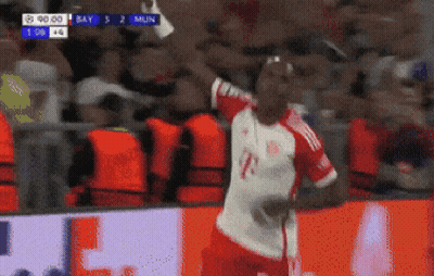 Soccer Player In Red And White Jersey Celebrates Goal Against Bayern Munich GIF