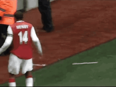 Soccer Player In Red And White Jersey Number 14 GIF