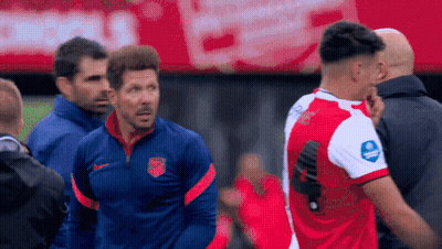Soccer Player In Red And White Jersey With Blue Nike Logo GIF