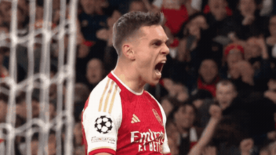 Soccer Player In Red And White Jersey With Emirates GIF