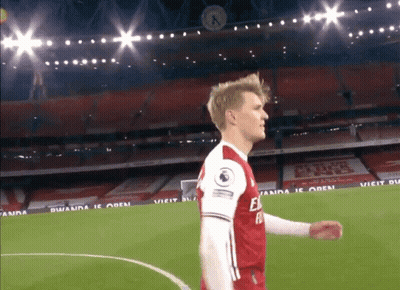 Soccer Player In Red And White Jersey With Fly Emirates GIF
