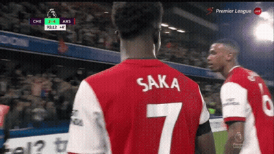 Soccer Player In Red And White Jersey With Saka GIF
