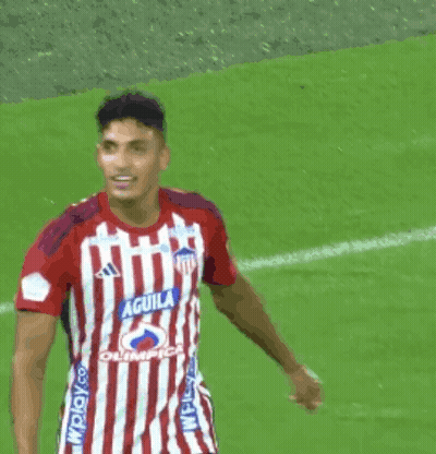 Soccer Player In Red And White Striped Jersey Saying Aguila GIF
