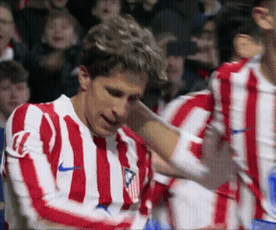Soccer Player In Red And White Striped Jersey With Letter L GIF