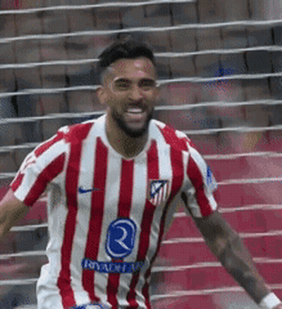 Soccer Player In Red And White Striped Jersey With Letter R GIF