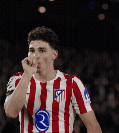 Soccer Player In Red And White Striped Jersey With Letter R GIF