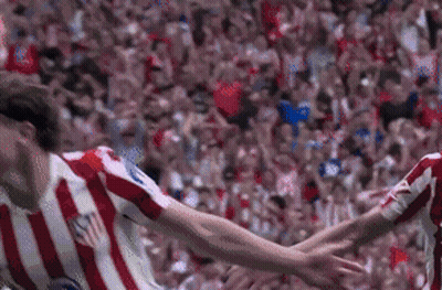 Soccer Player In Red And White Striped Shirt Jumping GIF