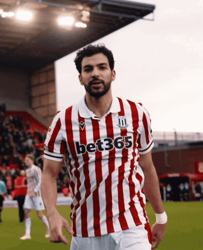 Soccer Player In Red And White Striped Shirt Saying Bet365 GIF
