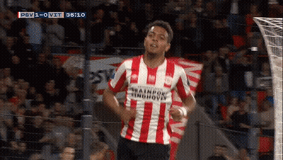 Soccer Player In Red And White Striped Shirt Saying Trainport Eindhoven GIF