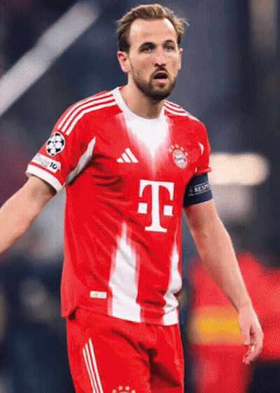 Soccer Player In Red And White Uniform With Letter T GIF