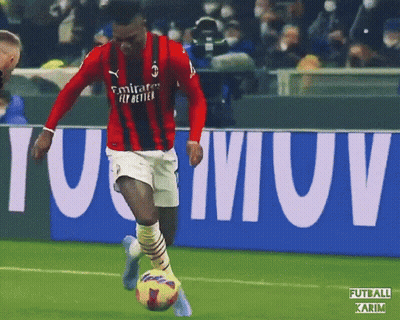 Soccer Player In Red Emirates Fly Better Jersey Kicking Ball GIF
