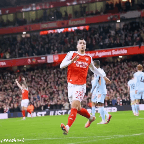 Soccer Player In Red Emirates Fly Better Jersey Running GIF