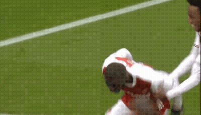 Soccer Player In Red Emirates Fly Better Jersey Running GIF