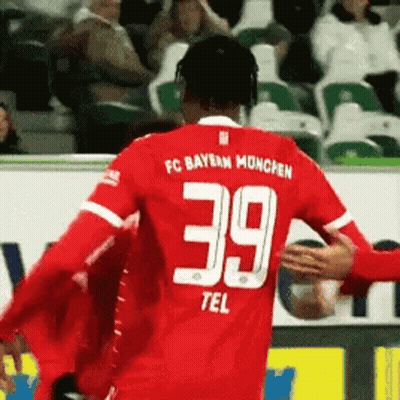 Soccer Player In Red Jersey 39 Hugged By Fan GIF
