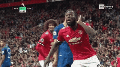 Soccer Player In Red Jersey Celebrating Goal GIF