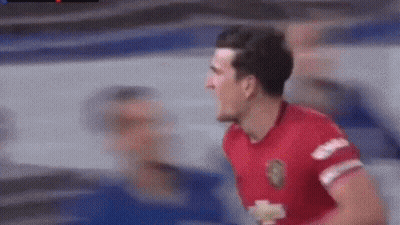 Soccer Player In Red Jersey Celebrating Goal GIF