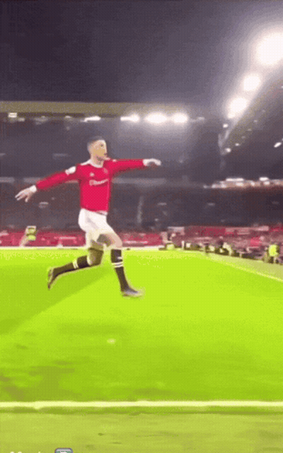 Soccer Player In Red Jersey Jumping GIF