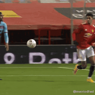Soccer Player In Red Jersey Kicking Ball GIF