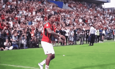 Soccer Player In Red Jersey Number 10 Running GIF