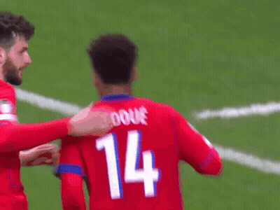 Soccer Player In Red Jersey Number 14 GIF