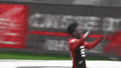 Soccer Player In Red Jersey Number 2 Running GIF